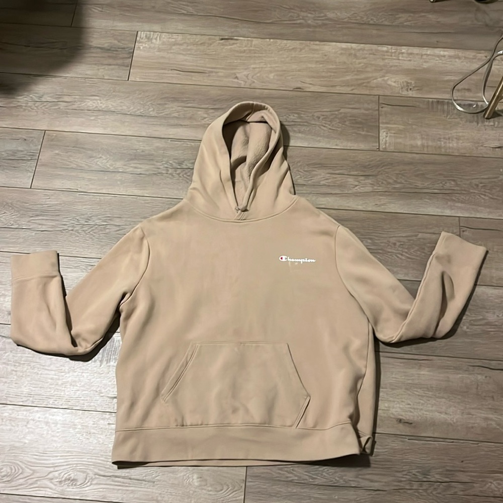 Champion hoodie tan color
Slight stains 
Women’s large